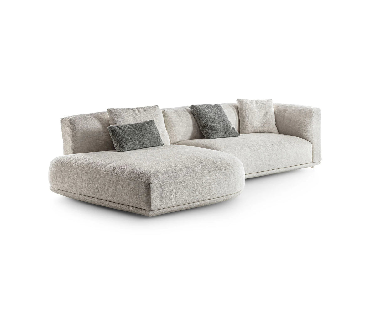 Frigerio Felix Sectional Sofa modular designer sectional with upholstered cushions and refined metal details Casa Design Group