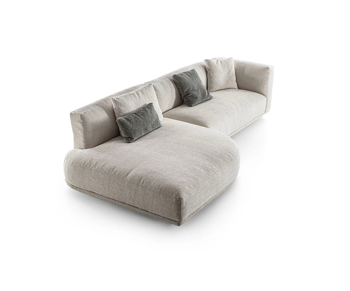 Frigerio Felix Sectional Sofa modular designer sectional with upholstered cushions and refined metal details Casa Design Group