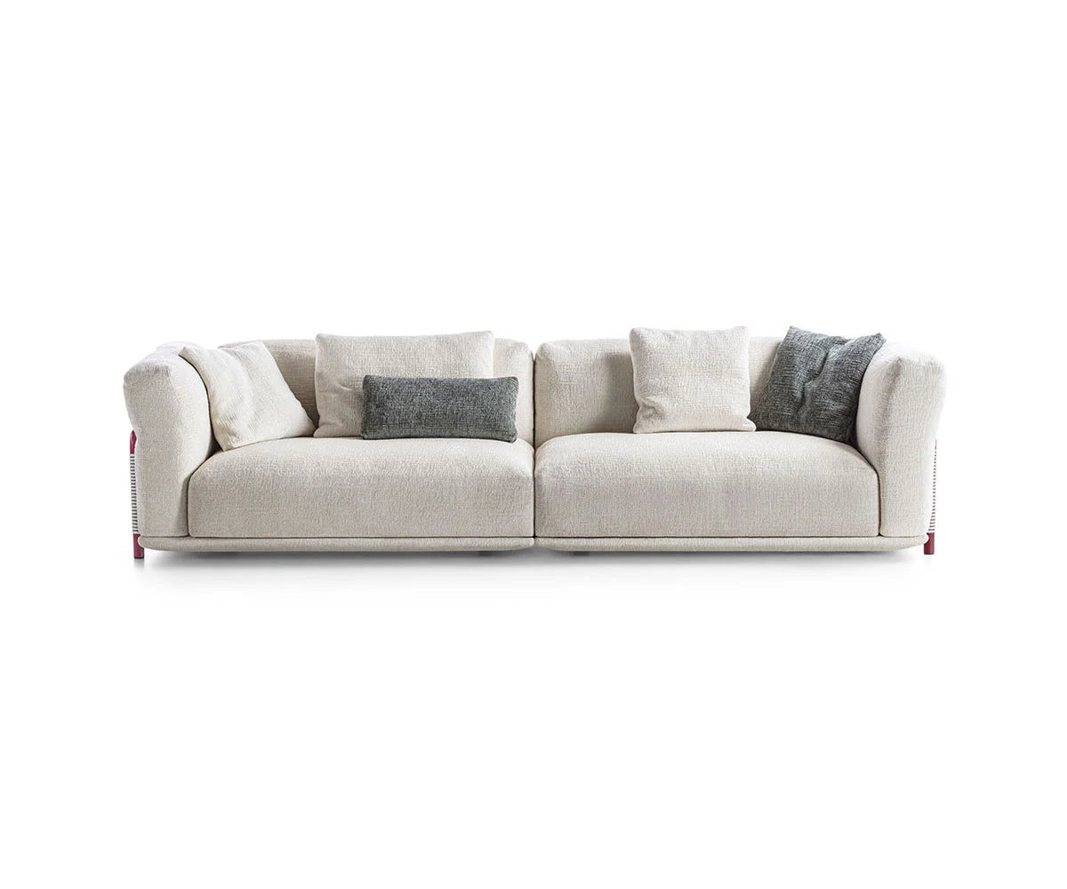 Frigerio Felix Sofa modular designer sofa with upholstered cushions and refined metal details Casa Design Group