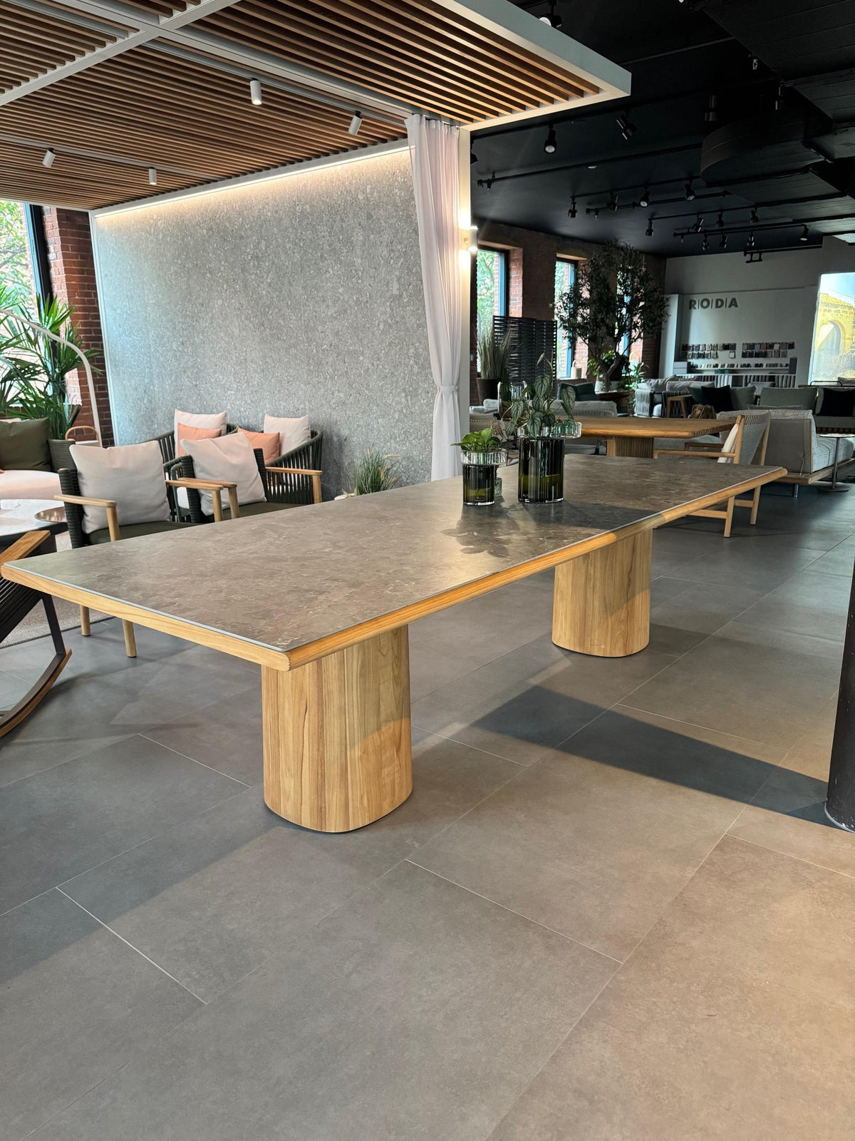 High End Floor Sample Giro Outdoor Dining Table by Kettal Casa Design Group