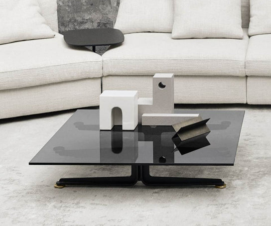 Floyd-Hi Coffee Table by Living Divani with a tempered glass top and laser-cut sheet steel base.