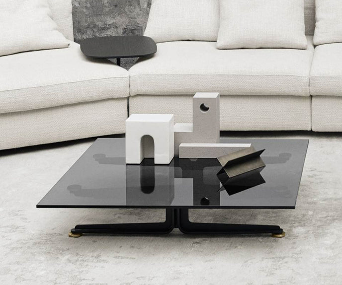 Floyd-Hi Coffee Table by Living Divani with a tempered glass top and laser-cut sheet steel base.