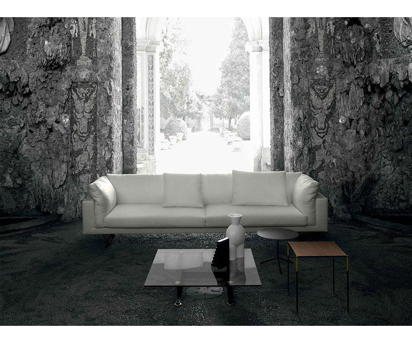 Floyd-Hi Coffee Table by Living Divani with a tempered glass top and laser-cut sheet steel base.