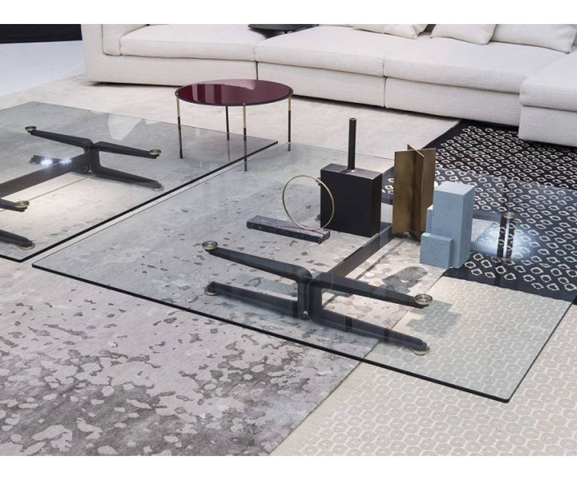 Floyd-Hi Coffee Table by Living Divani with a tempered glass top and laser-cut sheet steel base.