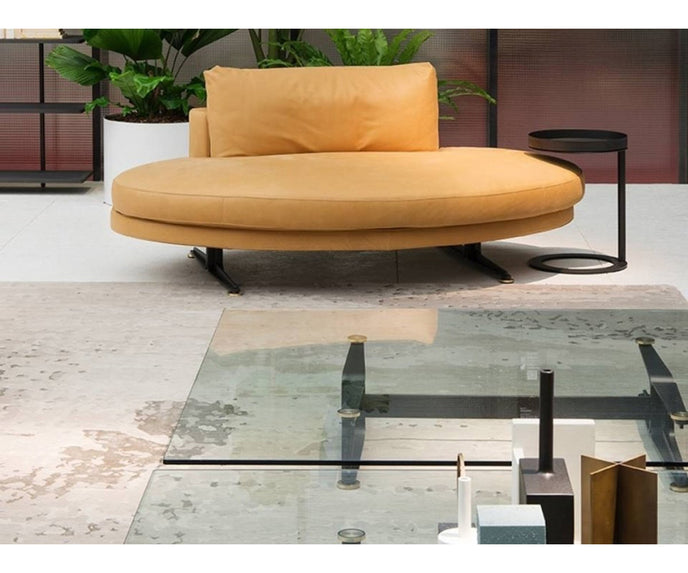 Floyd-Hi Coffee Table by Living Divani with a tempered glass top and laser-cut sheet steel base.