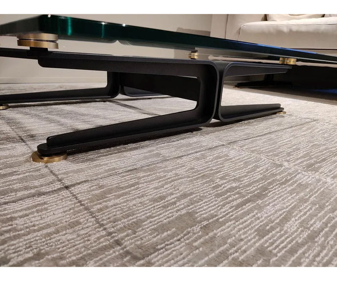 Floyd-Hi Coffee Table by Living Divani with a tempered glass top and laser-cut sheet steel base.