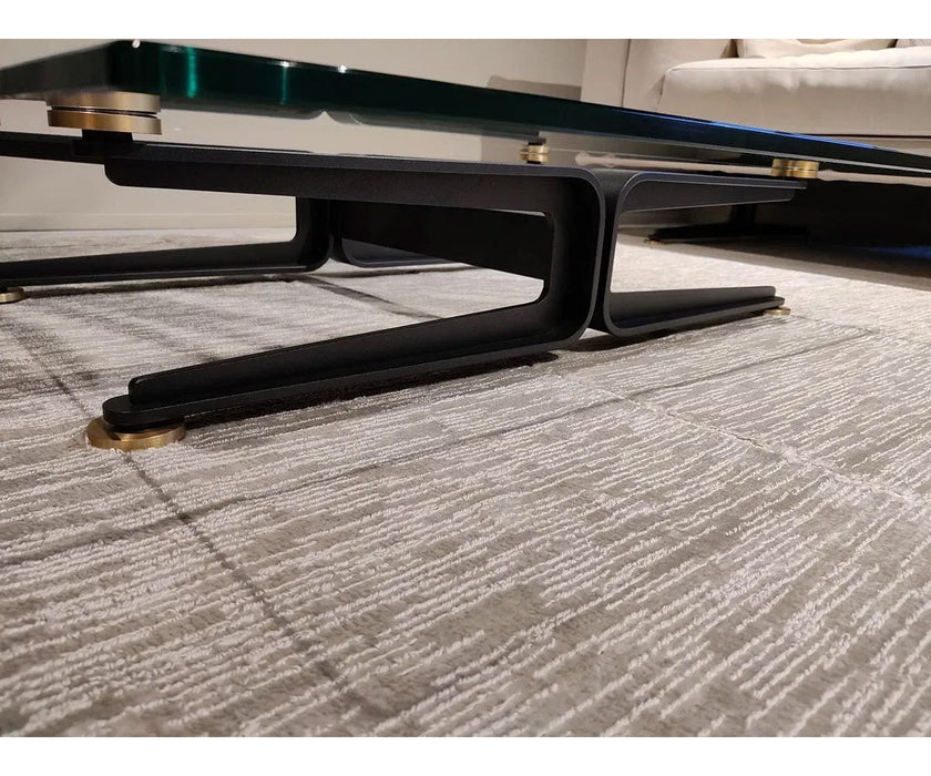 Floyd-Hi Coffee Table by Living Divani with a tempered glass top and laser-cut sheet steel base.