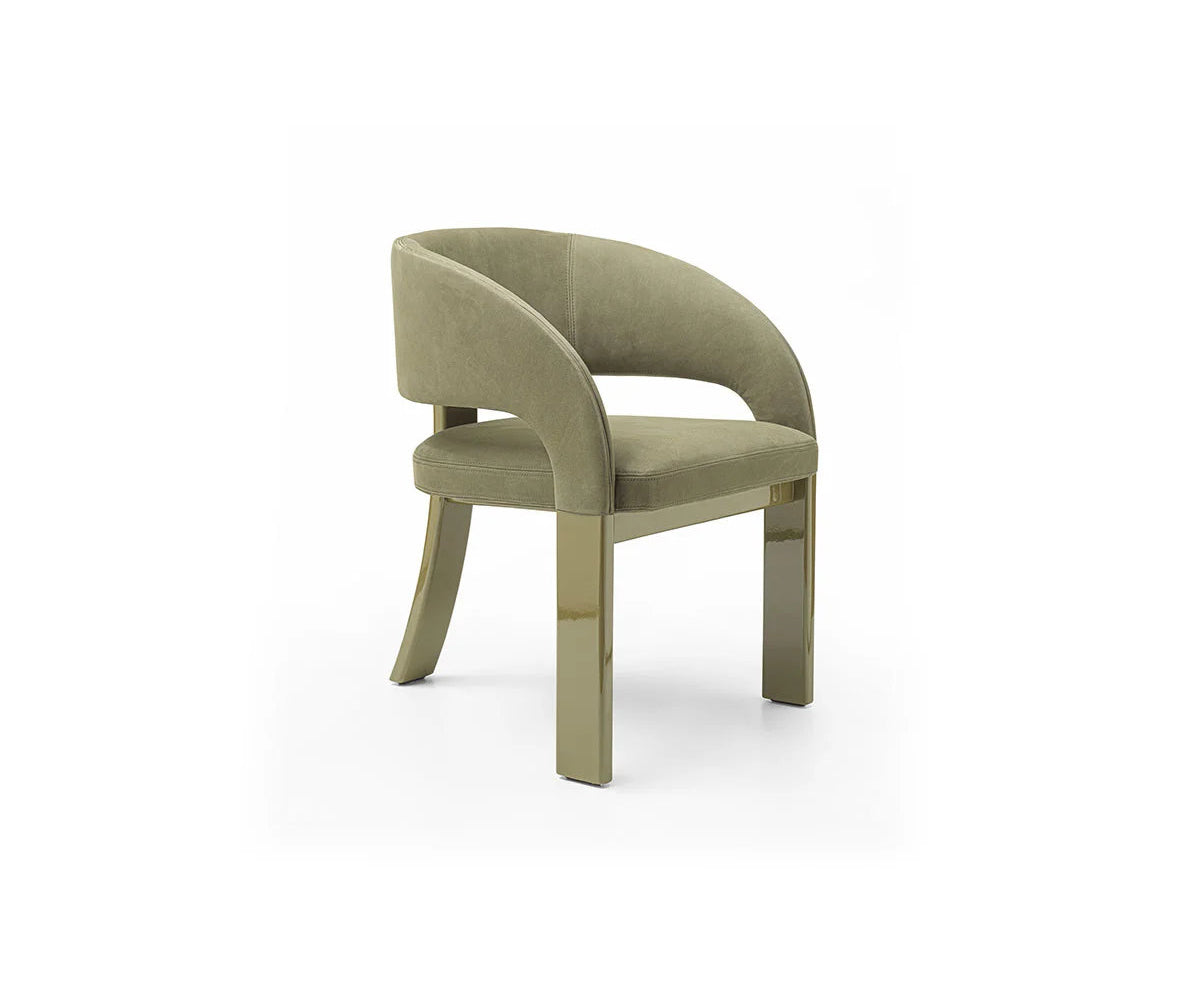 Contemporary Fosca dining chair by Frigerio with sculptural upholstered design