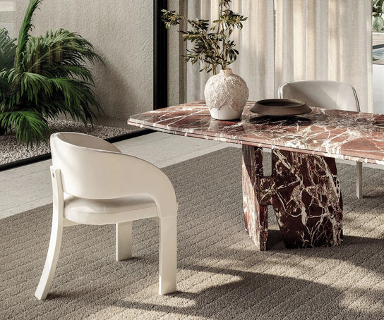 Contemporary Fosca dining chair by Frigerio with sculptural upholstered design