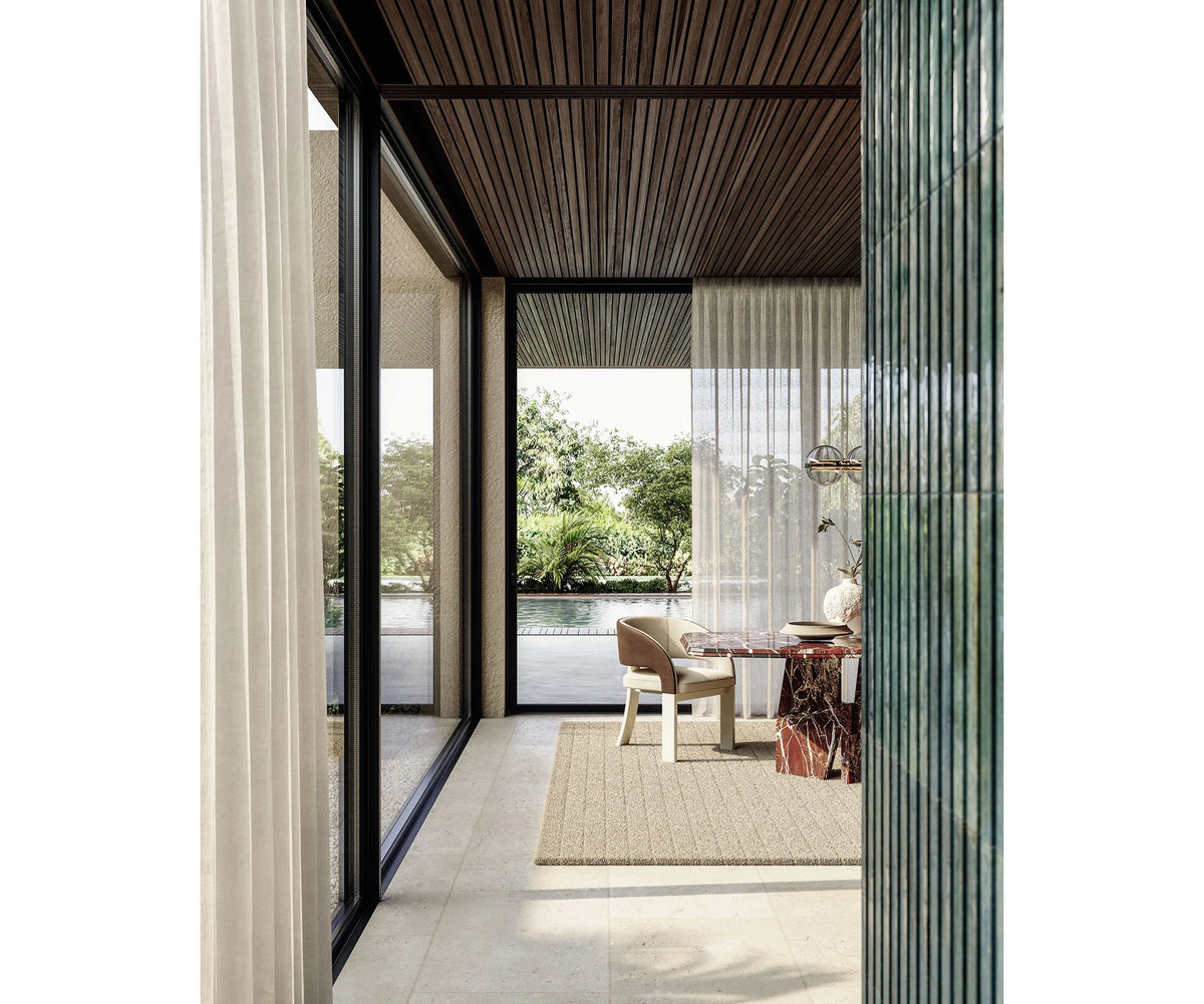 Contemporary Fosca dining chair by Frigerio with sculptural upholstered design