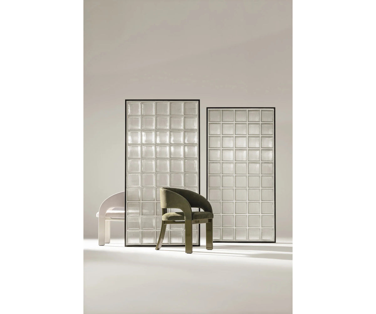 Contemporary Fosca dining chair by Frigerio with sculptural upholstered design