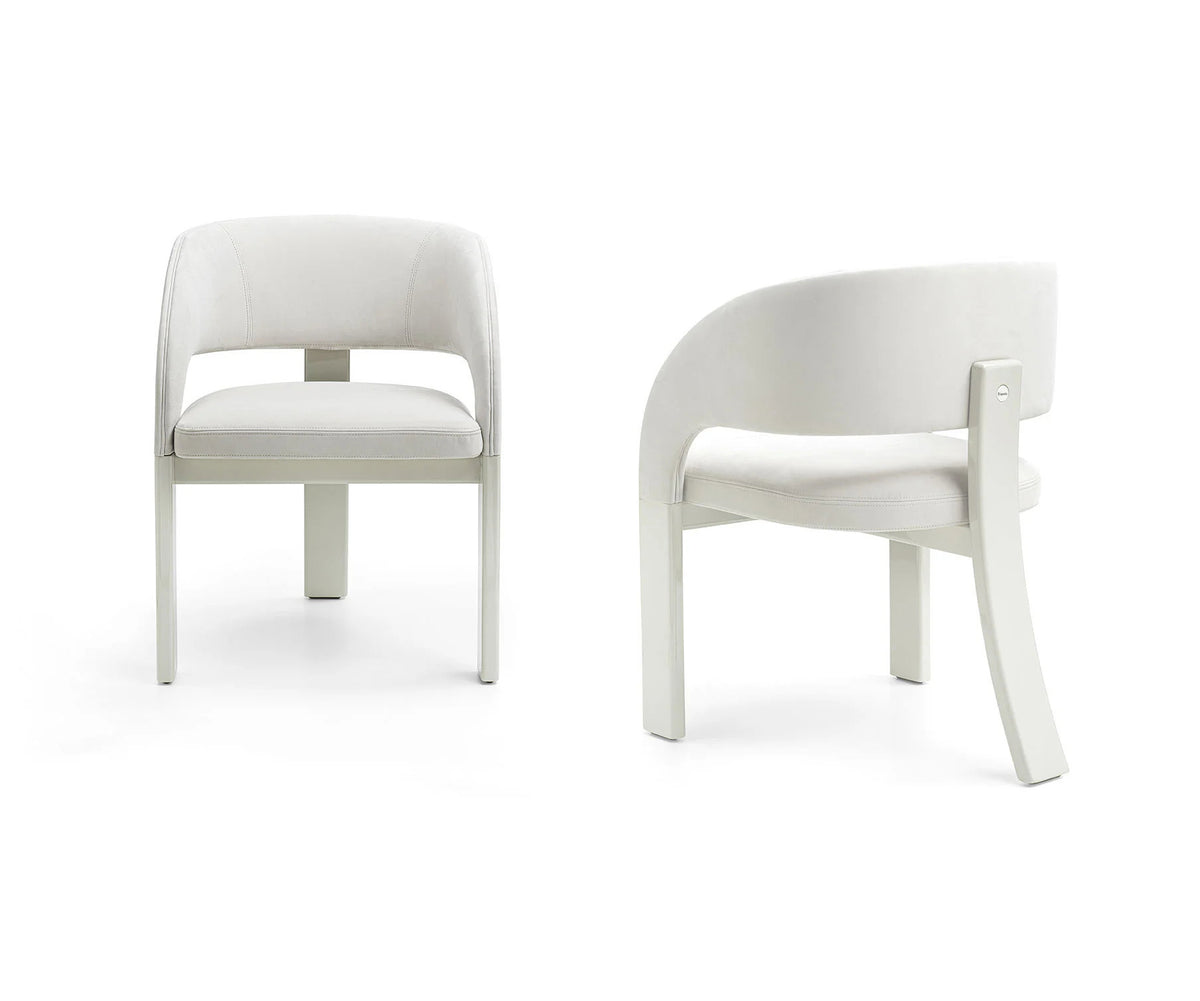 Contemporary Fosca dining chair by Frigerio with sculptural upholstered design