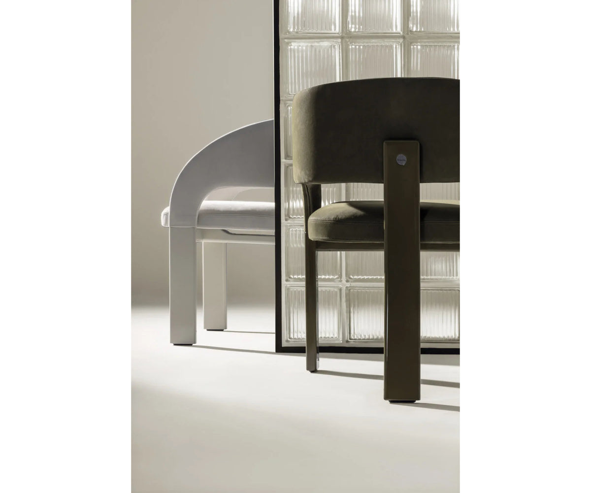 Contemporary Fosca dining chair by Frigerio with sculptural upholstered design