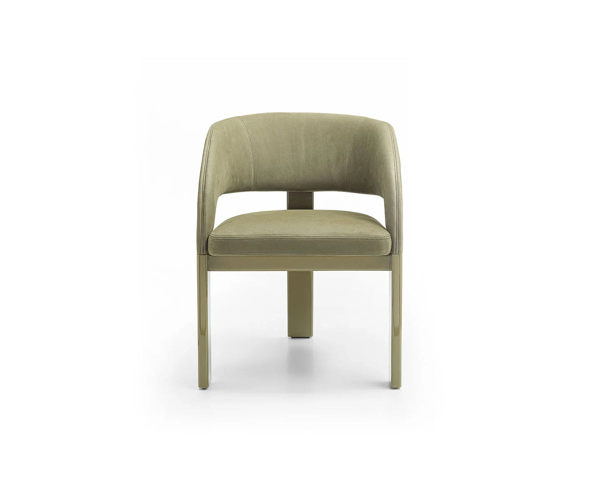 Contemporary Fosca dining chair by Frigerio with sculptural upholstered design
