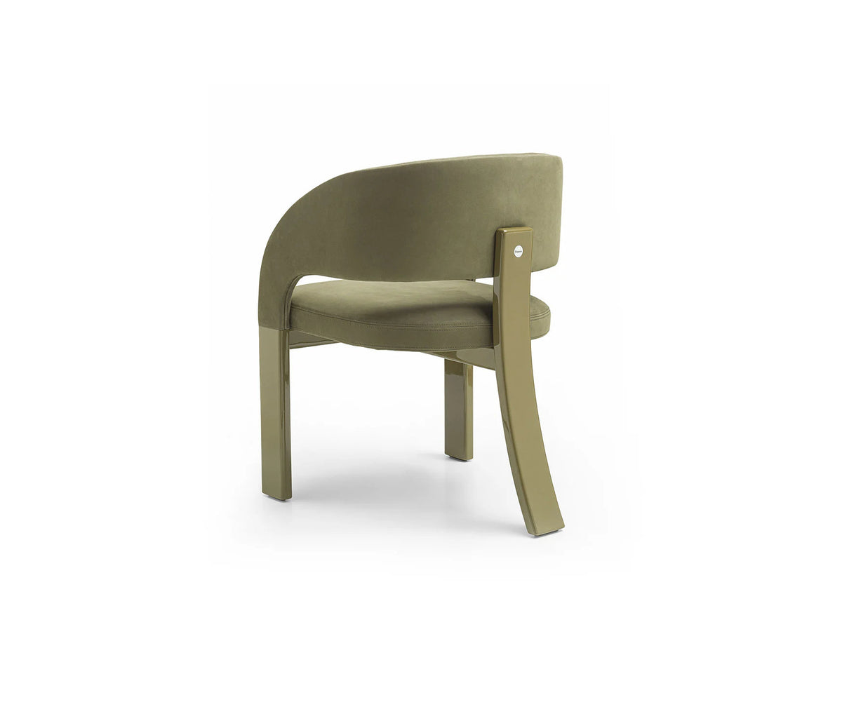 Contemporary Fosca dining chair by Frigerio with sculptural upholstered design