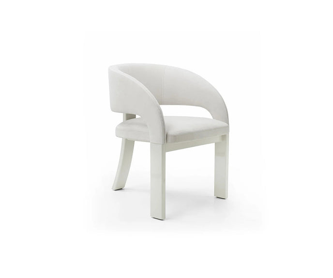 Contemporary Fosca dining chair by Frigerio with sculptural upholstered design