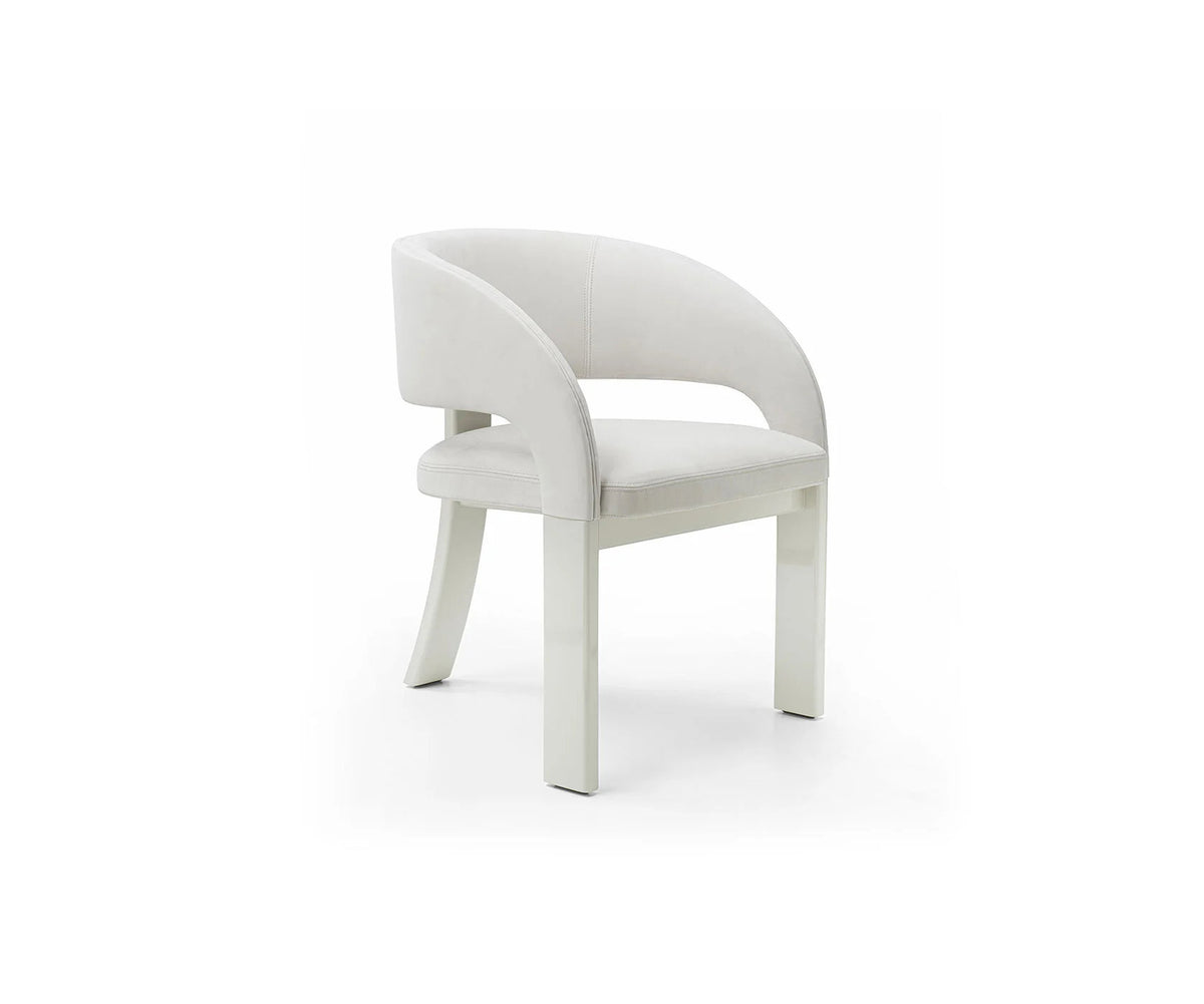 Contemporary Fosca dining chair by Frigerio with sculptural upholstered design