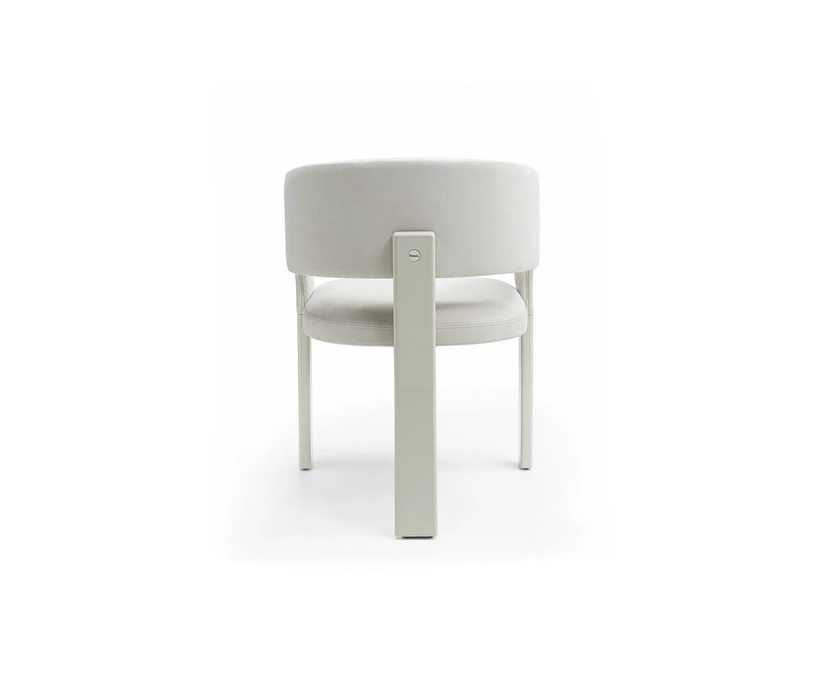 Contemporary Fosca dining chair by Frigerio with sculptural upholstered design
