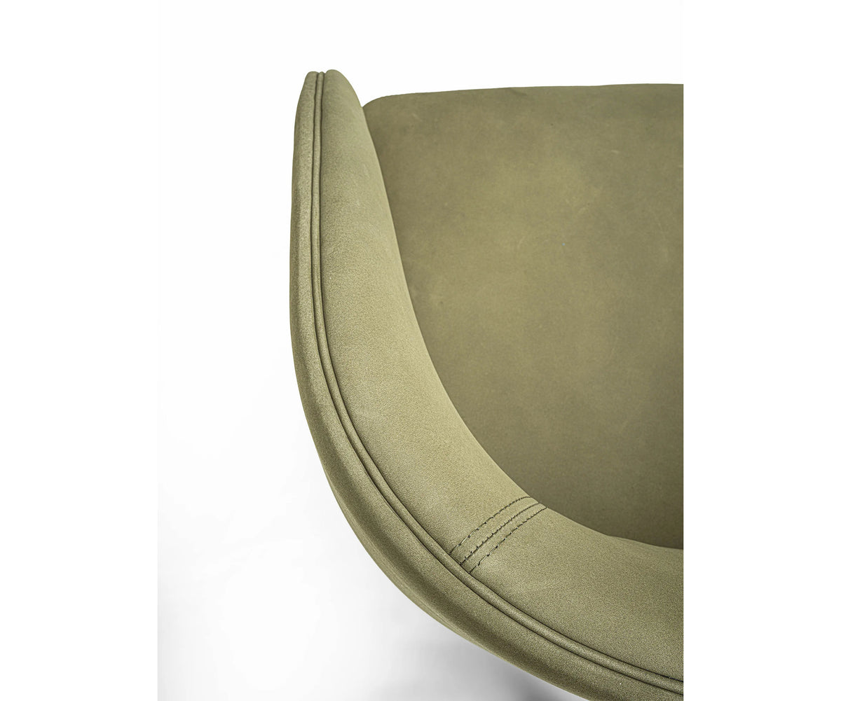 Contemporary Fosca dining chair by Frigerio with sculptural upholstered design