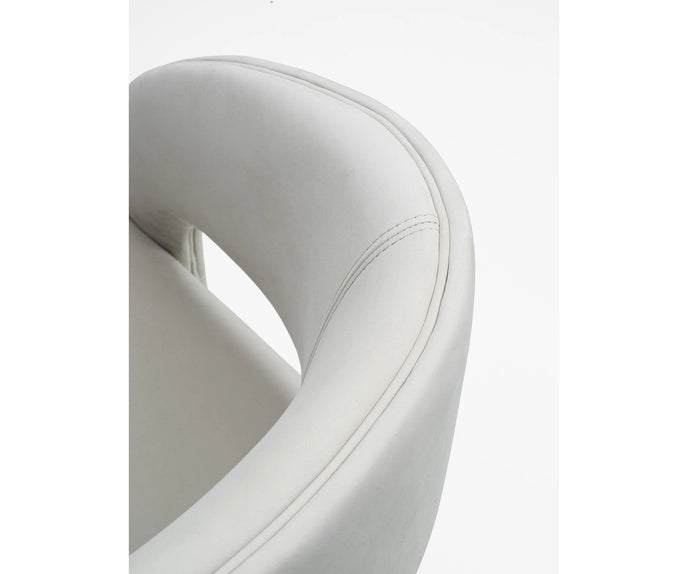 Contemporary Fosca dining chair by Frigerio with sculptural upholstered design
