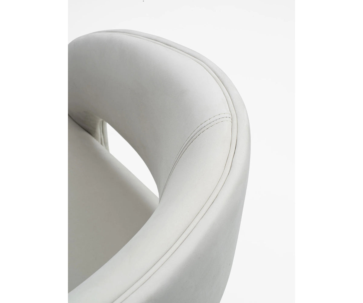 Contemporary Fosca dining chair by Frigerio with sculptural upholstered design
