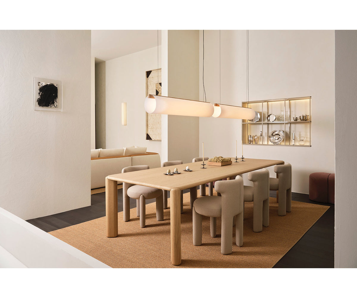 Frank Dining Table by Meridiani with tapered legs and refined contemporary design Casa Design Group