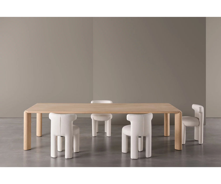 Frank Dining Table by Meridiani with tapered legs and refined contemporary design Casa Design Group