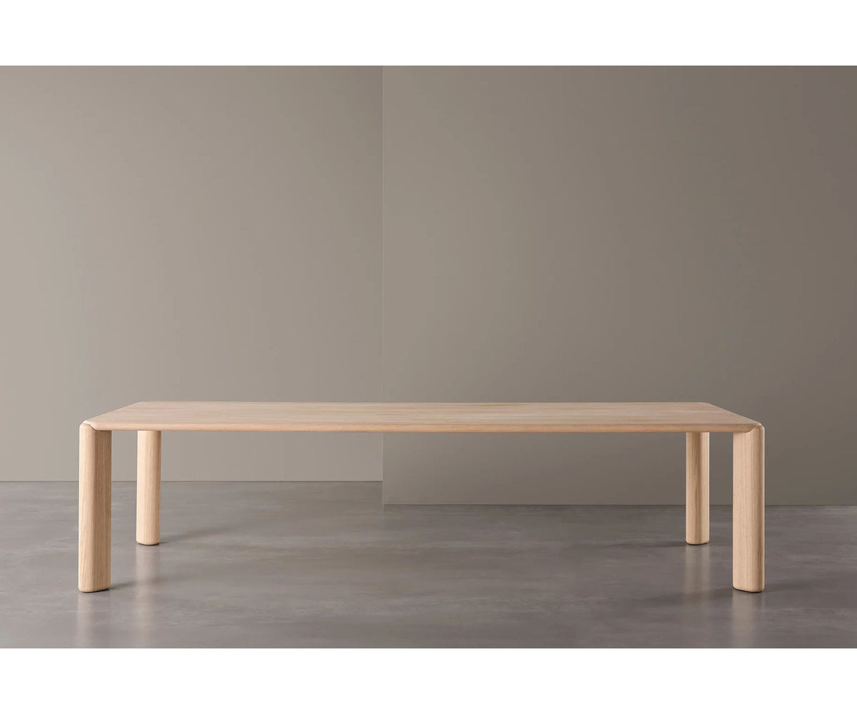 Frank Dining Table by Meridiani with tapered legs and refined contemporary design Casa Design Group