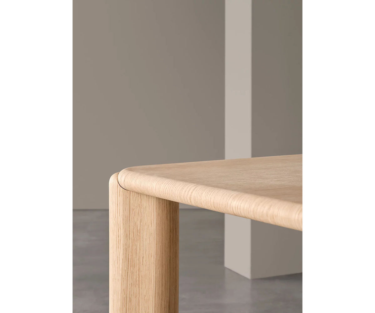 Frank Dining Table by Meridiani with tapered legs and refined contemporary design Casa Design Group