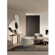 Frigerio Jackie upholstered armchair with solid ashwood legs and tailored fabric or leather upholstery, available at Casa Design Group.