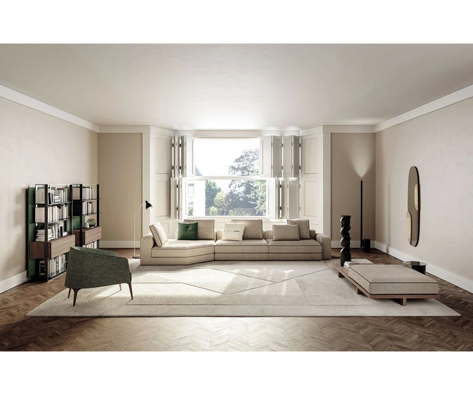 Frigerio Jackie upholstered armchair with solid ashwood legs and tailored fabric or leather upholstery, available at Casa Design Group.