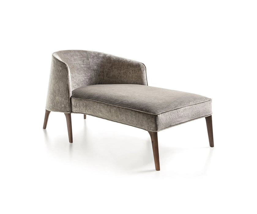 Frigerio Jackie chaise longue with solid ashwood legs and tailored fabric or leather upholstery, available at Casa Design Group.