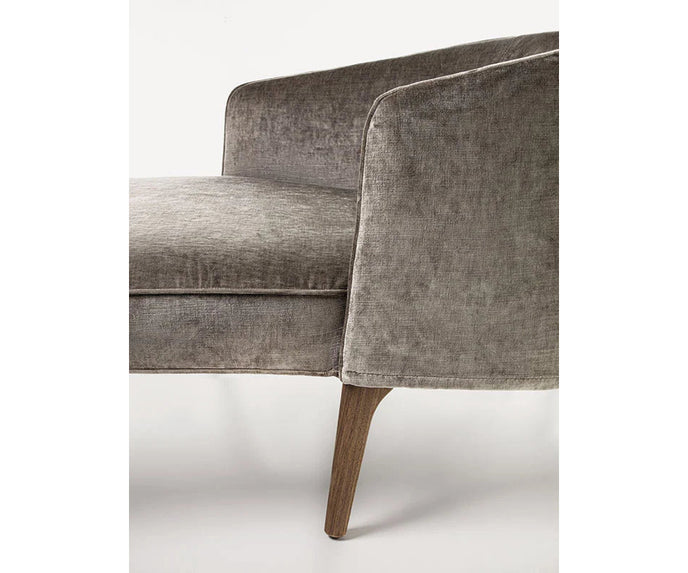 Frigerio Jackie chaise longue with solid ashwood legs and tailored fabric or leather upholstery, available at Casa Design Group.