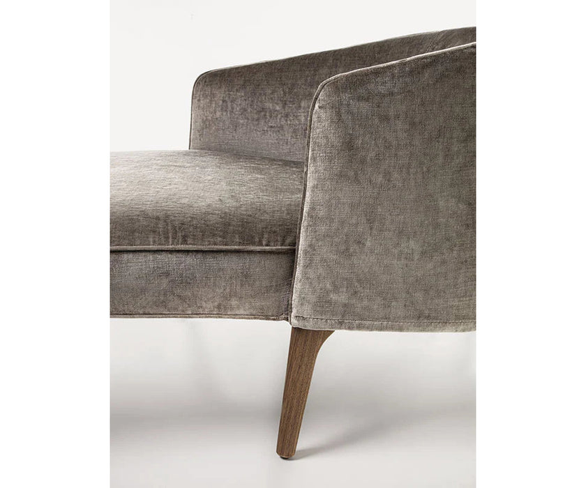 Frigerio Jackie chaise longue with solid ashwood legs and tailored fabric or leather upholstery, available at Casa Design Group.