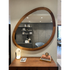 Giolo floor sample mirror by Porada with sculptural Canaletta walnut frame | Casa Design Group