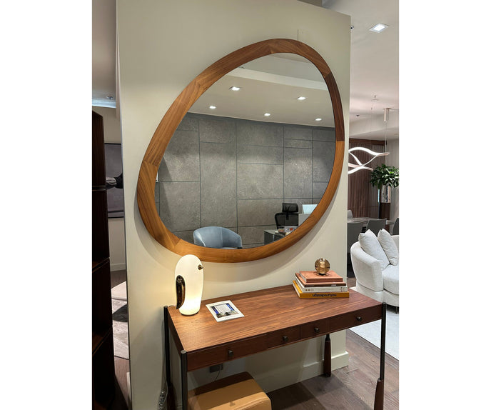 Giolo floor sample mirror by Porada with sculptural Canaletta walnut frame | Casa Design Group
