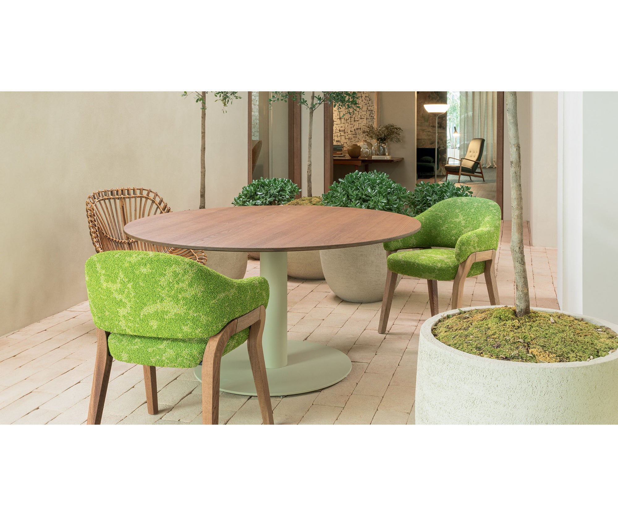 Giro Outdoor Dining Table by Paola Lenti with Handcrafted Tops and Stylish Aluminium Base | Casa Design Group