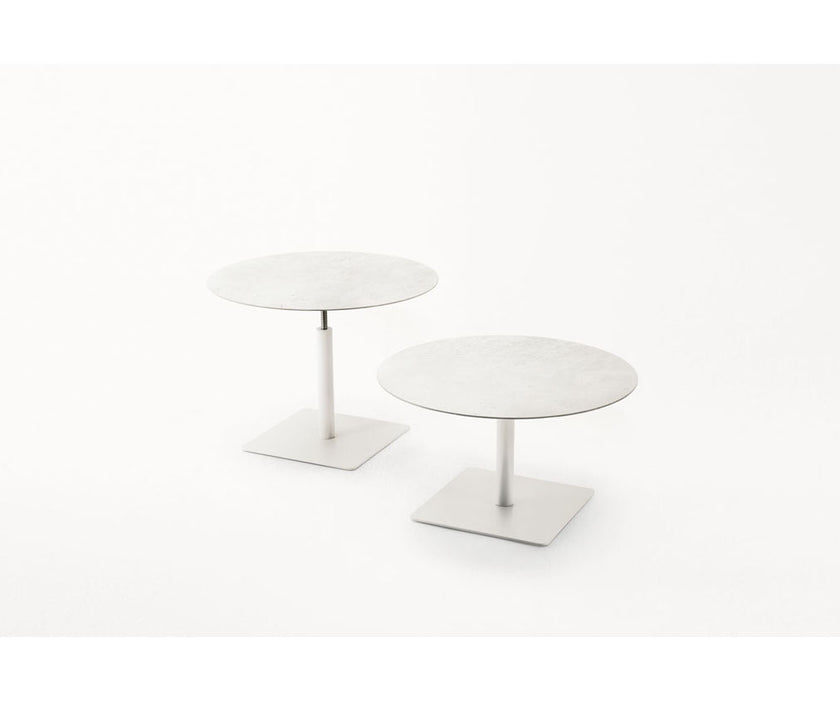 Giro Outdoor Dining Table by Paola Lenti with Handcrafted Tops and Stylish Aluminium Base | Casa Design Group