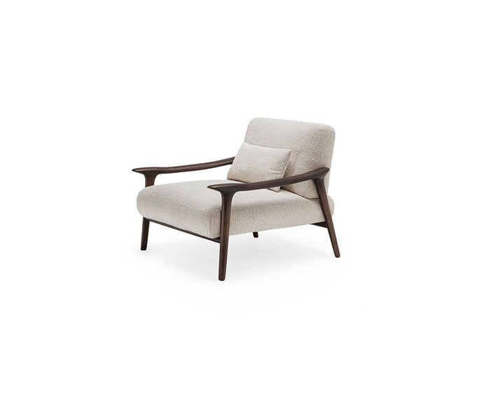 Giselle Lounge Chair with sculpted ashwood frame, integrated wooden armrests and generously upholstered cushions by Cattelan Italia | Casa Design Group