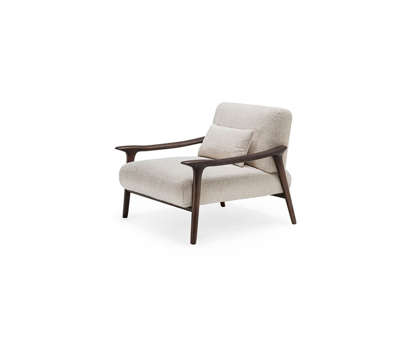 Giselle Lounge Chair with sculpted ashwood frame, integrated wooden armrests and generously upholstered cushions by Cattelan Italia | Casa Design Group