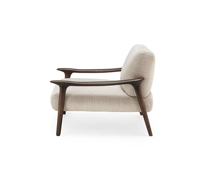 Giselle Lounge Chair with sculpted ashwood frame, integrated wooden armrests and generously upholstered cushions by Cattelan Italia | Casa Design Group