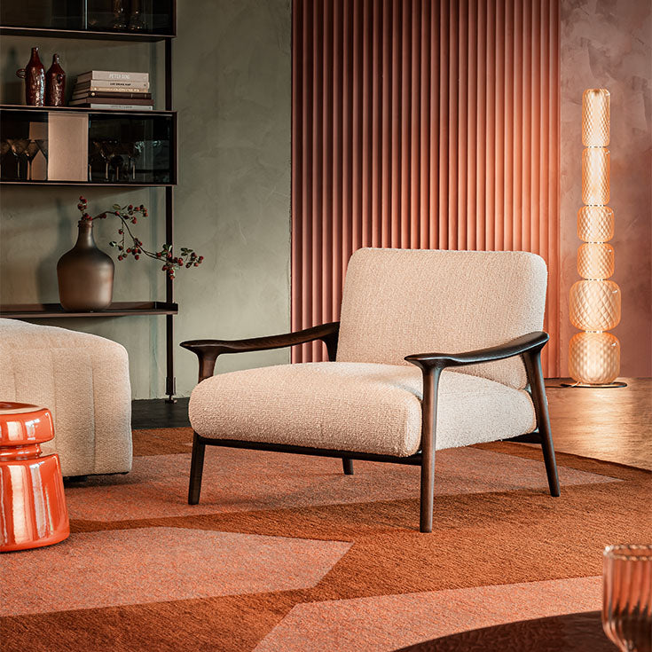 Giselle Lounge Chair with sculpted ashwood frame, integrated wooden armrests and generously upholstered cushions by Cattelan Italia | Casa Design Group