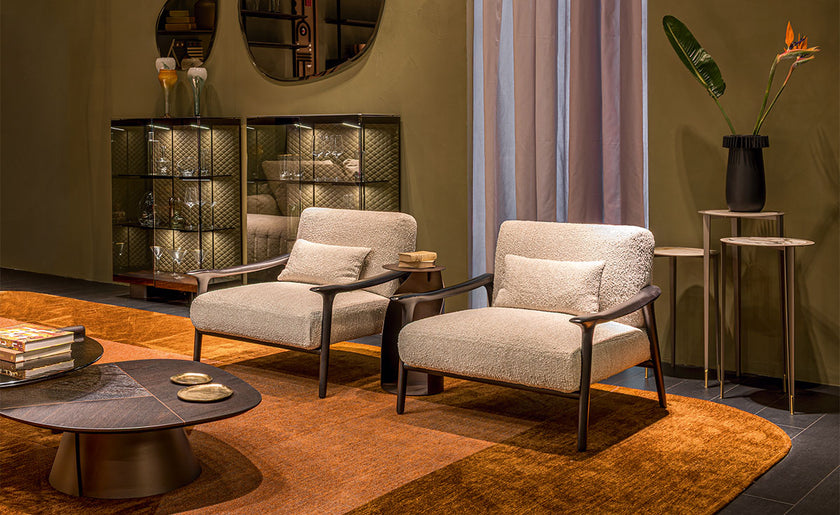 Giselle Lounge Chair with sculpted ashwood frame, integrated wooden armrests and generously upholstered cushions by Cattelan Italia | Casa Design Group