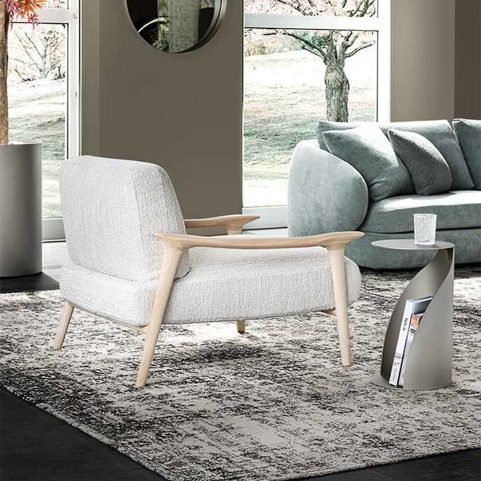 Giselle Lounge Chair with sculpted ashwood frame, integrated wooden armrests and generously upholstered cushions by Cattelan Italia | Casa Design Group