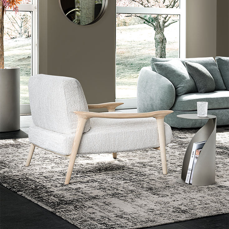 Giselle Lounge Chair with sculpted ashwood frame, integrated wooden armrests and generously upholstered cushions by Cattelan Italia | Casa Design Group