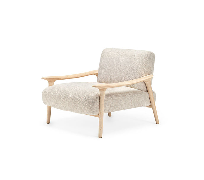 Giselle Lounge Chair with sculpted ashwood frame, integrated wooden armrests and generously upholstered cushions by Cattelan Italia | Casa Design Group