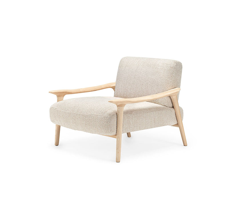 Giselle Lounge Chair with sculpted ashwood frame, integrated wooden armrests and generously upholstered cushions by Cattelan Italia | Casa Design Group