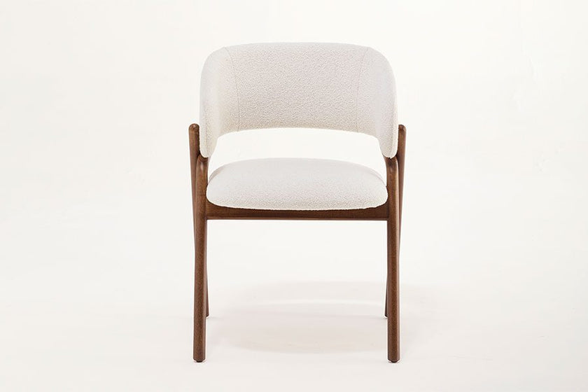 Giulia S Dining Chair with rounded solid ash wood legs, upholstered seat and curved backrest by Accento | Casa Design Group