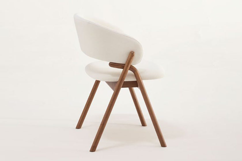 Giulia S Dining Chair with rounded solid ash wood legs, upholstered seat and curved backrest by Accento | Casa Design Group