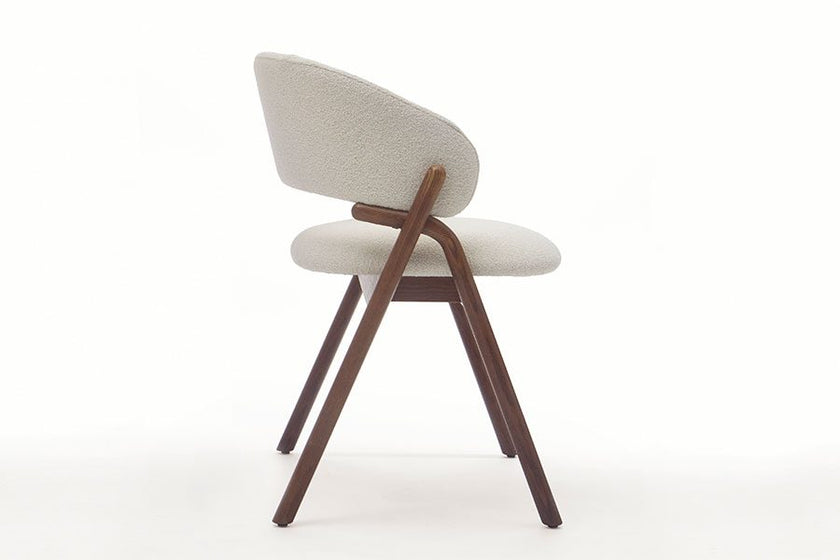 Giulia S Dining Chair with rounded solid ash wood legs, upholstered seat and curved backrest by Accento | Casa Design Group